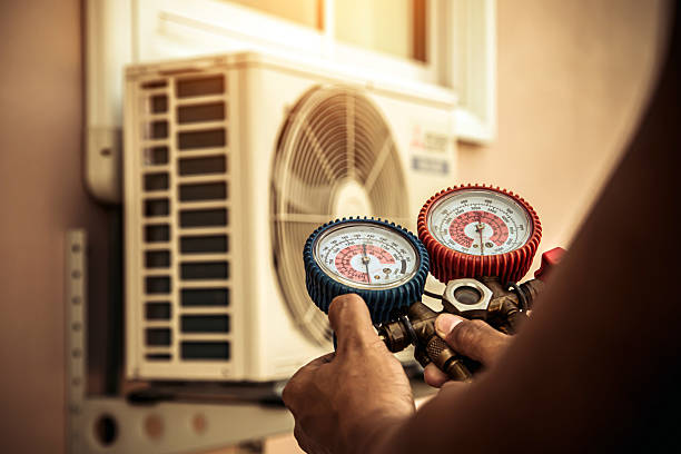 Professional Air Conditioning Service technician working in Hixson, TN